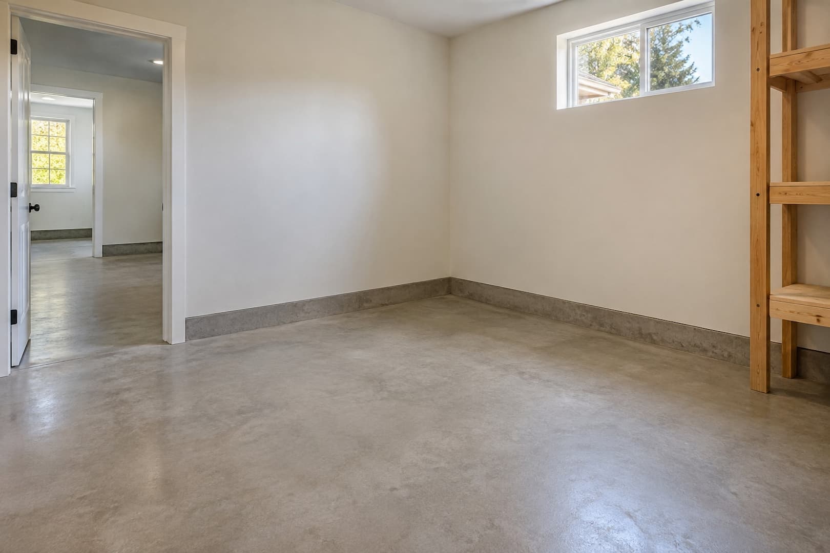 Residential utility area with clear space for water heater access and servicing